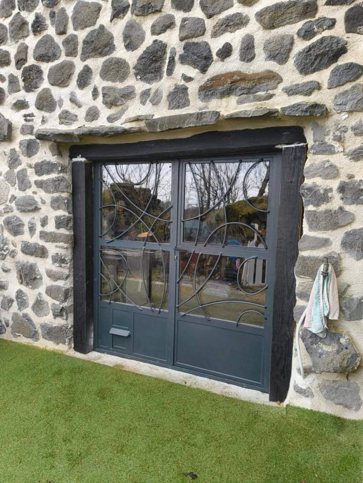 Porte dentrée en fer forgé vitrée Le Monastier-sur-Gazeille